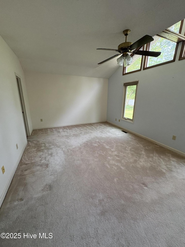 1608 Brices Creek Rd, New Bern, NC 28562 - unfurnished room featuring lofted ceiling, carpet flooring, a ceiling fan, and baseboards