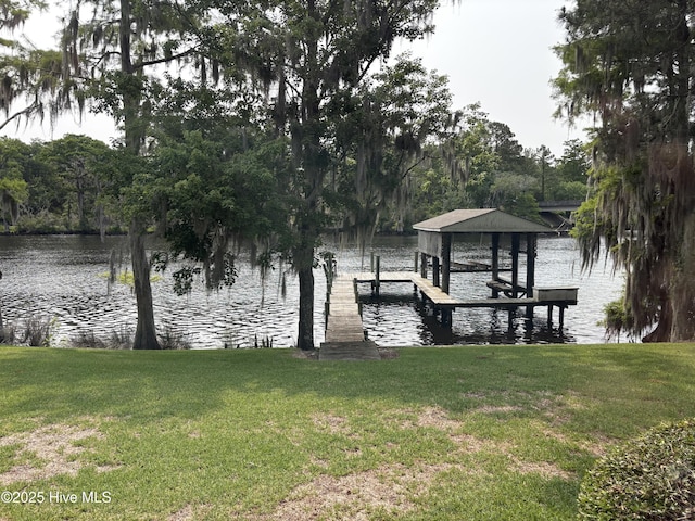 1608 Brices Creek Rd, New Bern, NC 28562 - dock area featuring a lawn, a water view, and boat lift