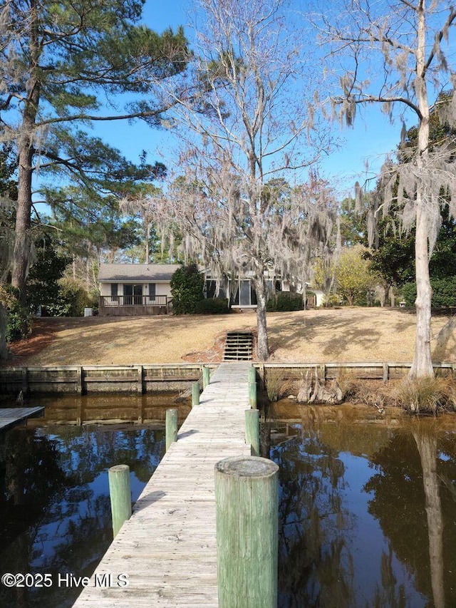 1608 Brices Creek Rd, New Bern, NC 28562 - dock area featuring a water view and a boat ramp