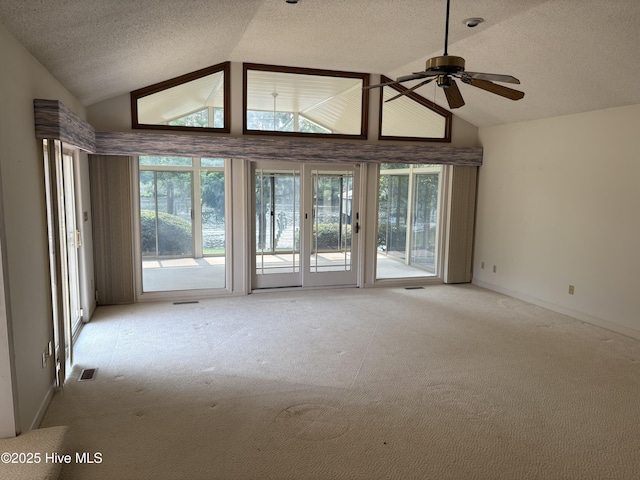 1608 Brices Creek Rd, New Bern, NC 28562 - carpeted spare room with lofted ceiling, healthy amount of natural light, a textured ceiling, ceiling fan, and baseboards