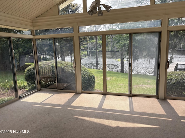 1608 Brices Creek Rd, New Bern, NC 28562 - unfurnished sunroom featuring a water view, ceiling fan, plenty of natural light, and lofted ceiling