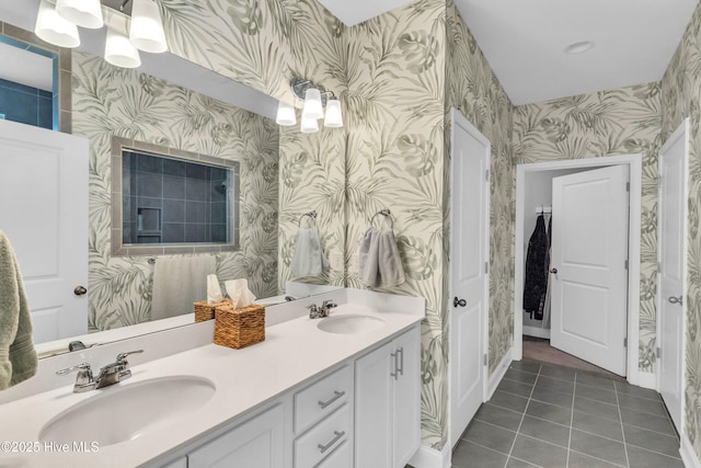 1700 Sun Palms Blvd SE, Bolivia, NC 28422 - bathroom with wallpapered walls, tile patterned flooring, double vanity, and baseboards