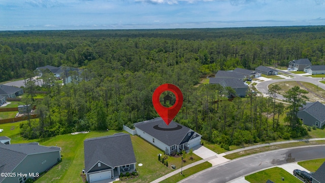 1700 Sun Palms Blvd SE, Bolivia, NC 28422 - aerial view of residential area with a heavily wooded area