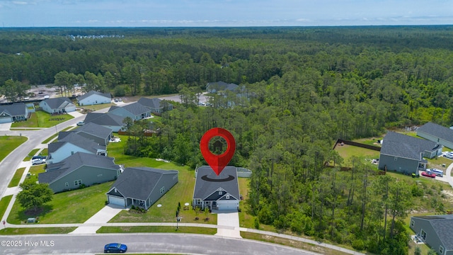 1700 Sun Palms Blvd SE, Bolivia, NC 28422 - aerial view of residential area with a heavily wooded area
