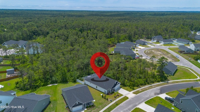 1700 Sun Palms Blvd SE, Bolivia, NC 28422 - aerial perspective of suburban area with a forest