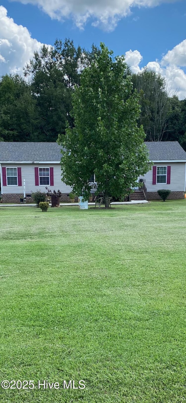 1746 Over The Farm Rd, Halifax, NC 27839 - view of front of house featuring a front yard and a shingled roof
