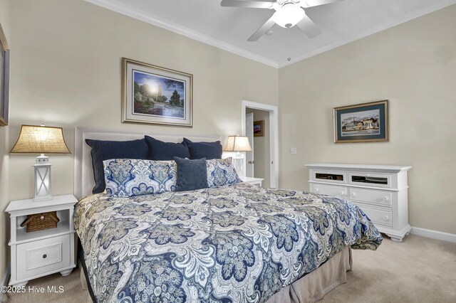 644 Village Park Dr Unit 207, Wilmington, NC 28405 - carpeted bedroom with crown molding, a ceiling fan, and baseboards