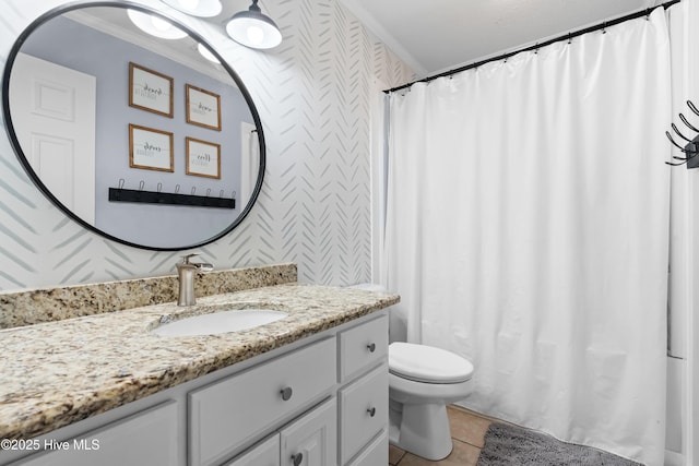 105 Teal Pointe Dr, Pikeville, NC 27863 - bathroom featuring vanity, toilet, wallpapered walls, tile patterned floors, and curtained shower