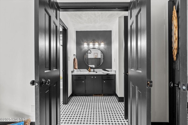 105 Tartan Trl, Southern Pines, NC 28387 - bathroom with vanity, a textured ceiling, and tile patterned floors