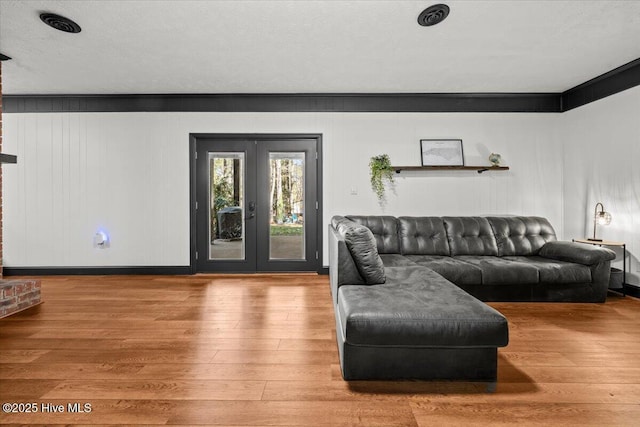 105 Tartan Trl, Southern Pines, NC 28387 - living area featuring hardwood / wood-style flooring and french doors