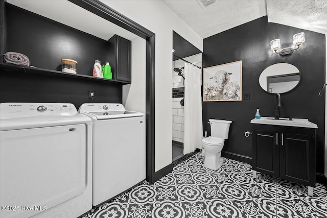 105 Tartan Trl, Southern Pines, NC 28387 - full bathroom featuring a textured ceiling, washer and clothes dryer, lofted ceiling, a shower with shower curtain, and vanity