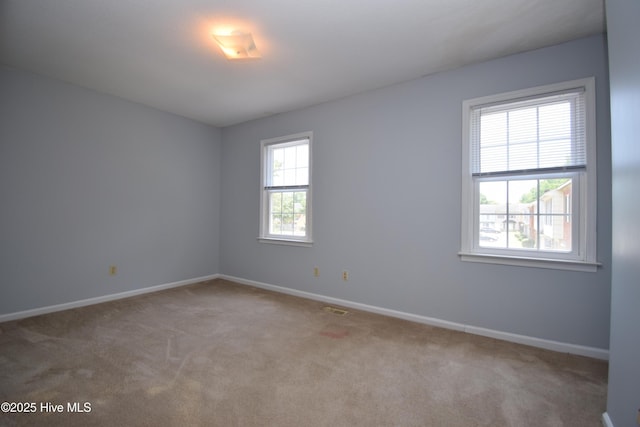 110 Concord Dr Unit C, Greenville, NC 27834 - spare room featuring carpet floors and baseboards