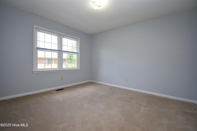 110 Concord Dr Unit C, Greenville, NC 27834 - carpeted spare room with baseboards
