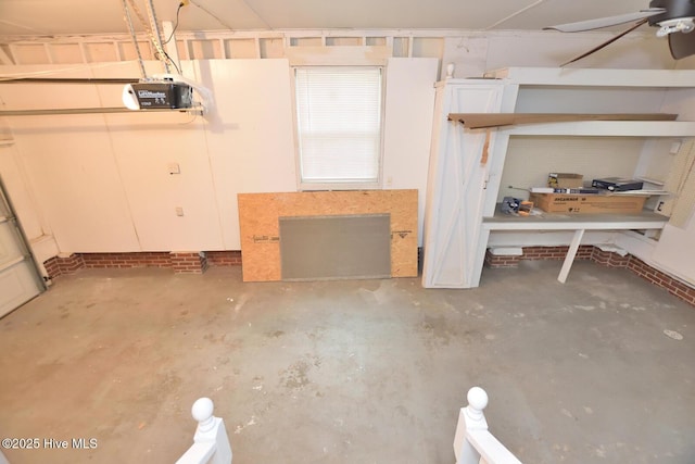 853 Burton St, Rocky Mount, NC 27803 - garage with a garage door opener and a ceiling fan