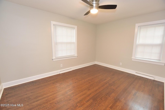 853 Burton St, Rocky Mount, NC 27803 - empty room featuring dark wood finished floors, a baseboard heating unit, a ceiling fan, and baseboards