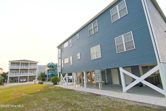 405 27th St Unit A, Sunset Beach, NC 28468 - view of rear view of property