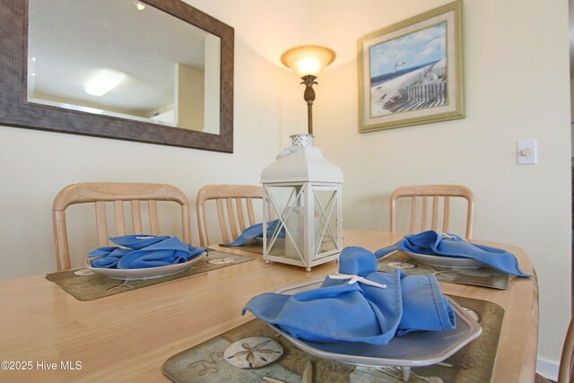 405 27th St Unit A, Sunset Beach, NC 28468 - misc room with wood finished floors