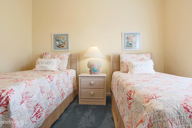 405 27th St Unit A, Sunset Beach, NC 28468 - bedroom featuring dark colored carpet