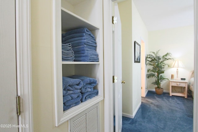 405 27th St Unit A, Sunset Beach, NC 28468 - corridor with baseboards and carpet floors