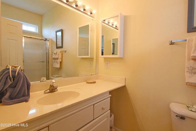 405 27th St Unit A, Sunset Beach, NC 28468 - full bath with toilet, vanity, and a shower with shower door