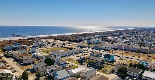 405 27th St Unit A, Sunset Beach, NC 28468 - aerial view of property and surrounding area featuring unending shoreline and nearby suburban area