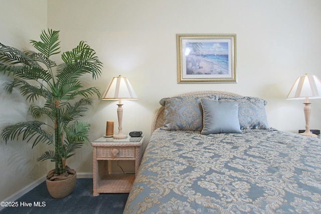 405 27th St Unit A, Sunset Beach, NC 28468 - bedroom featuring carpet floors and baseboards