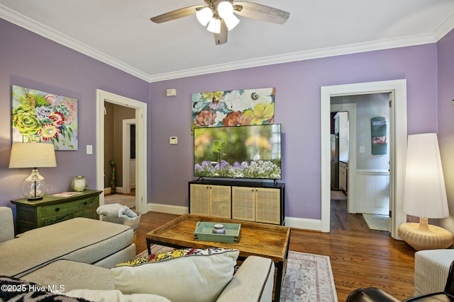 1305 Kenan St NW, Wilson, NC 27893 - living room featuring ornamental molding, ceiling fan, wood finished floors, and baseboards