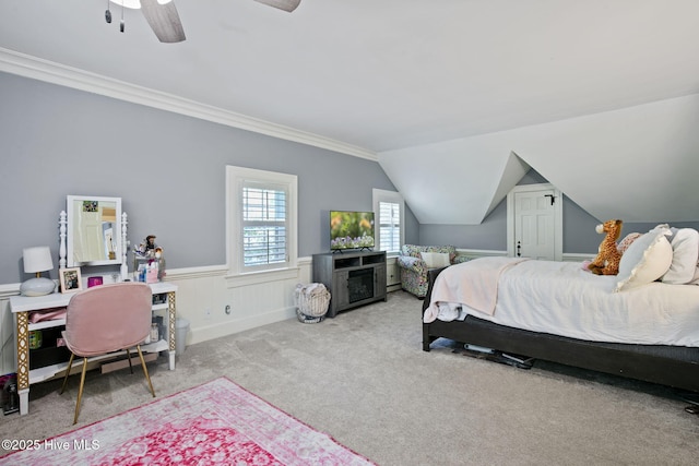 1305 Kenan St NW, Wilson, NC 27893 - bedroom featuring a wainscoted wall, carpet floors, ceiling fan, ornamental molding, and vaulted ceiling