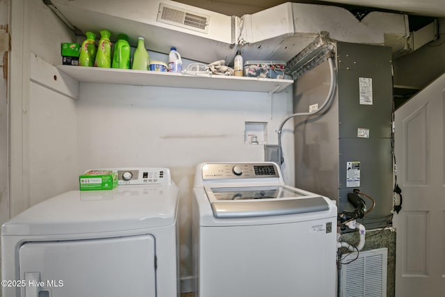 1305 Kenan St NW, Wilson, NC 27893 - washroom with independent washer and dryer