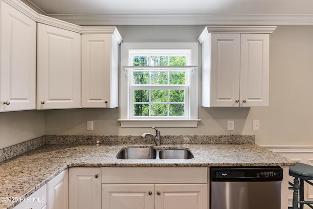 1711 Reidsville Rd, Southport, NC 28461 - kitchen with stainless steel dishwasher, a sink, white cabinets, healthy amount of natural light, and crown molding