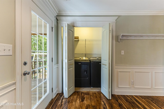 1711 Reidsville Rd, Southport, NC 28461 - doorway with separate washer and dryer, crown molding, and dark wood-style flooring