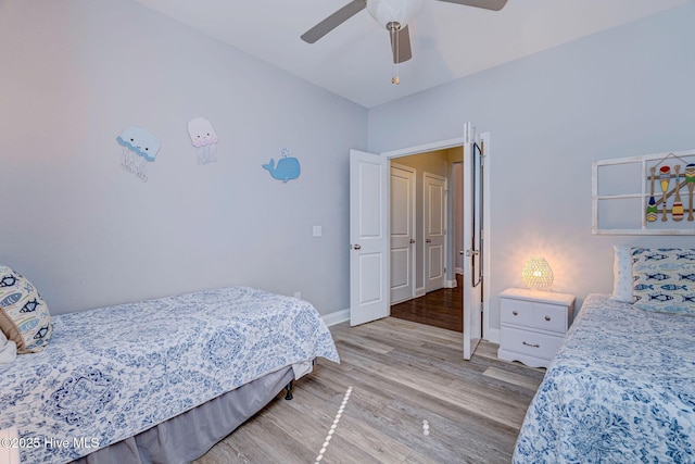 576 Steele Loop, Wilmington, NC 28411 - bedroom featuring light wood finished floors, baseboards, and ceiling fan