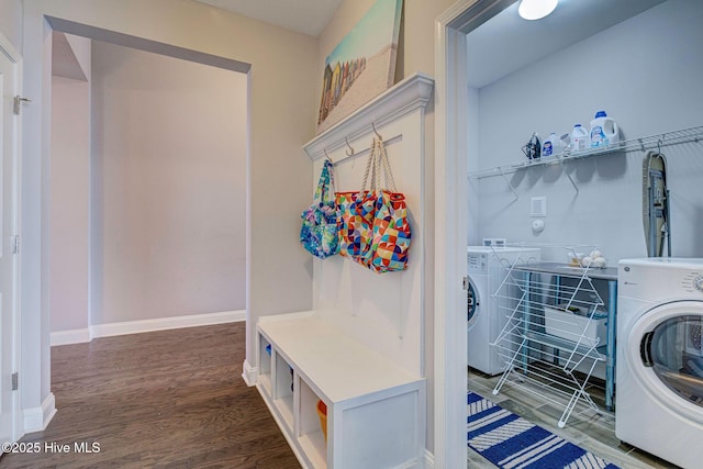576 Steele Loop, Wilmington, NC 28411 - laundry room featuring washer / dryer, wood finished floors, and baseboards