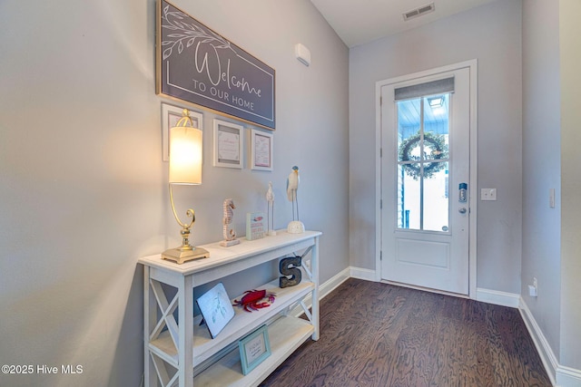 576 Steele Loop, Wilmington, NC 28411 - foyer featuring dark wood-style flooring and baseboards