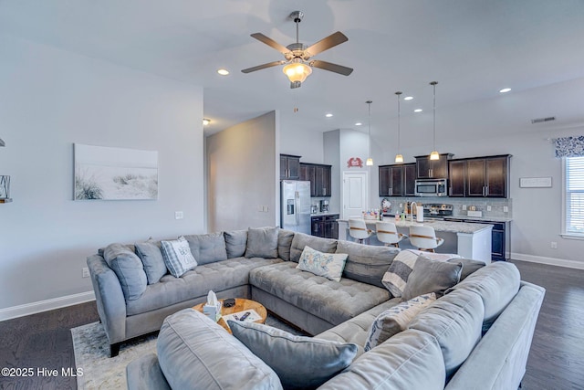576 Steele Loop, Wilmington, NC 28411 - living area featuring a ceiling fan, baseboards, dark wood-type flooring, and recessed lighting