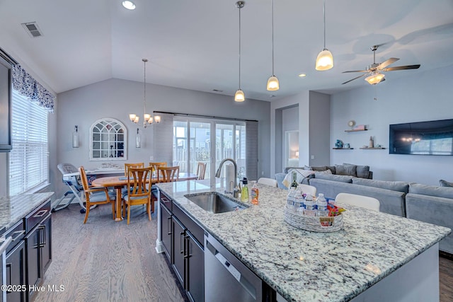 576 Steele Loop, Wilmington, NC 28411 - kitchen with a sink, stainless steel dishwasher, open floor plan, dark wood finished floors, and vaulted ceiling