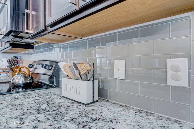 576 Steele Loop, Wilmington, NC 28411 - kitchen view of stainless steel range with electric cooktop and tasteful backsplash