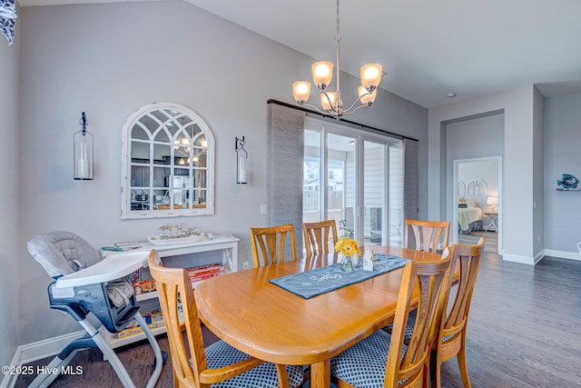 576 Steele Loop, Wilmington, NC 28411 - dining room with a chandelier, baseboards, and wood finished floors