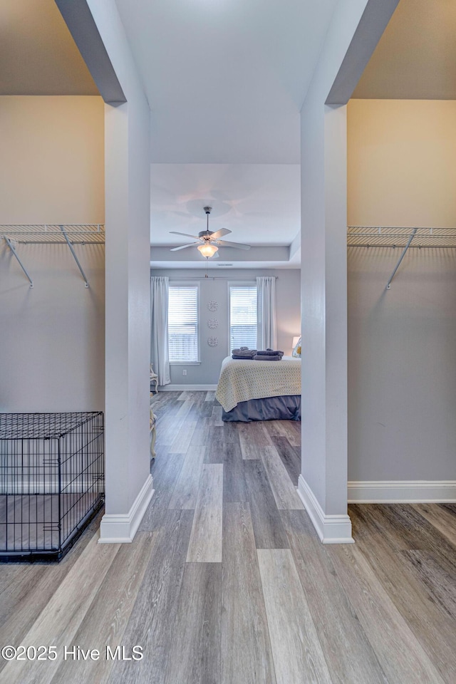 576 Steele Loop, Wilmington, NC 28411 - unfurnished bedroom featuring wood finished floors and baseboards