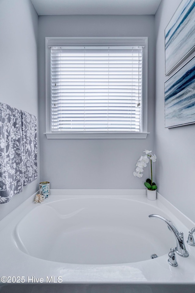 576 Steele Loop, Wilmington, NC 28411 - bathroom featuring a garden tub