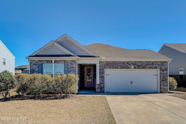 576 Steele Loop, Wilmington, NC 28411 - ranch-style house featuring an attached garage, concrete driveway, brick siding, and a front lawn