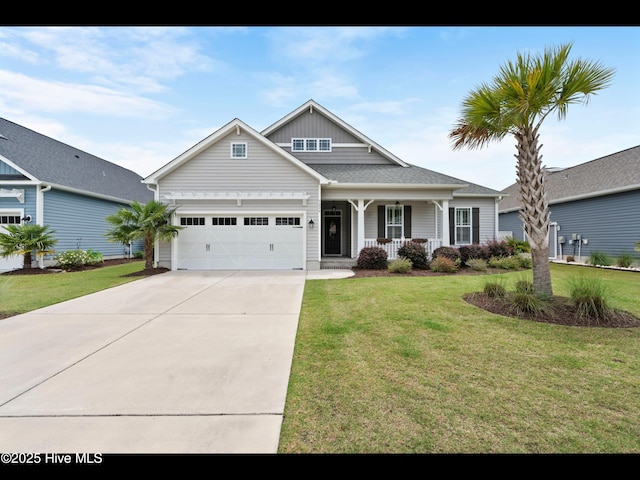 7024 Bonaventure St SW, Ocean Isle Beach, NC 28469 - view of front facade featuring a porch, driveway, a front yard, an attached garage, and board and batten siding