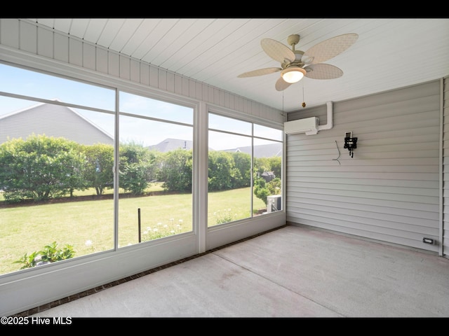 7024 Bonaventure St SW, Ocean Isle Beach, NC 28469 - unfurnished sunroom featuring a ceiling fan and a wall unit AC