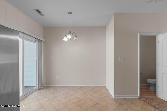 505 Oyster Rock Ln, Sneads Ferry, NC 28460 - unfurnished room with a chandelier and baseboards