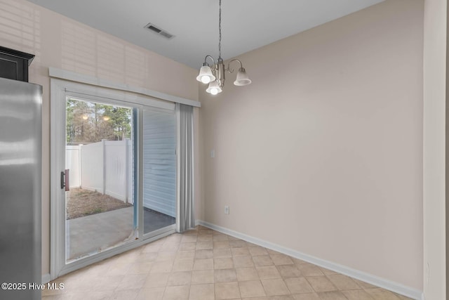 505 Oyster Rock Ln, Sneads Ferry, NC 28460 - unfurnished room featuring a chandelier and baseboards