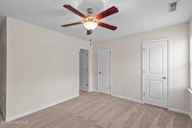 505 Oyster Rock Ln, Sneads Ferry, NC 28460 - unfurnished bedroom featuring carpet floors, baseboards, and ceiling fan