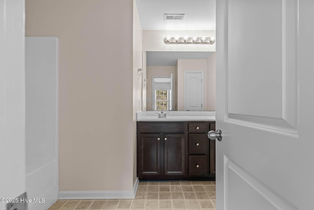 505 Oyster Rock Ln, Sneads Ferry, NC 28460 - bathroom featuring vanity and baseboards