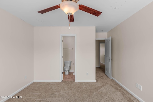 505 Oyster Rock Ln, Sneads Ferry, NC 28460 - unfurnished bedroom featuring carpet, baseboards, connected bathroom, and ceiling fan