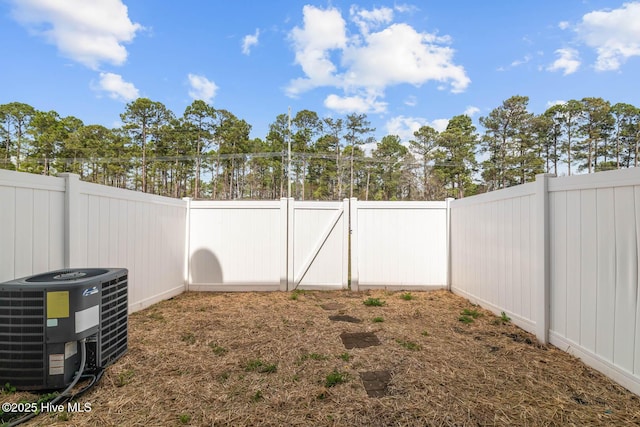 505 Oyster Rock Ln, Sneads Ferry, NC 28460 - fenced backyard with cooling unit