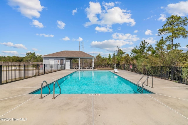 505 Oyster Rock Ln, Sneads Ferry, NC 28460 - community pool featuring a patio